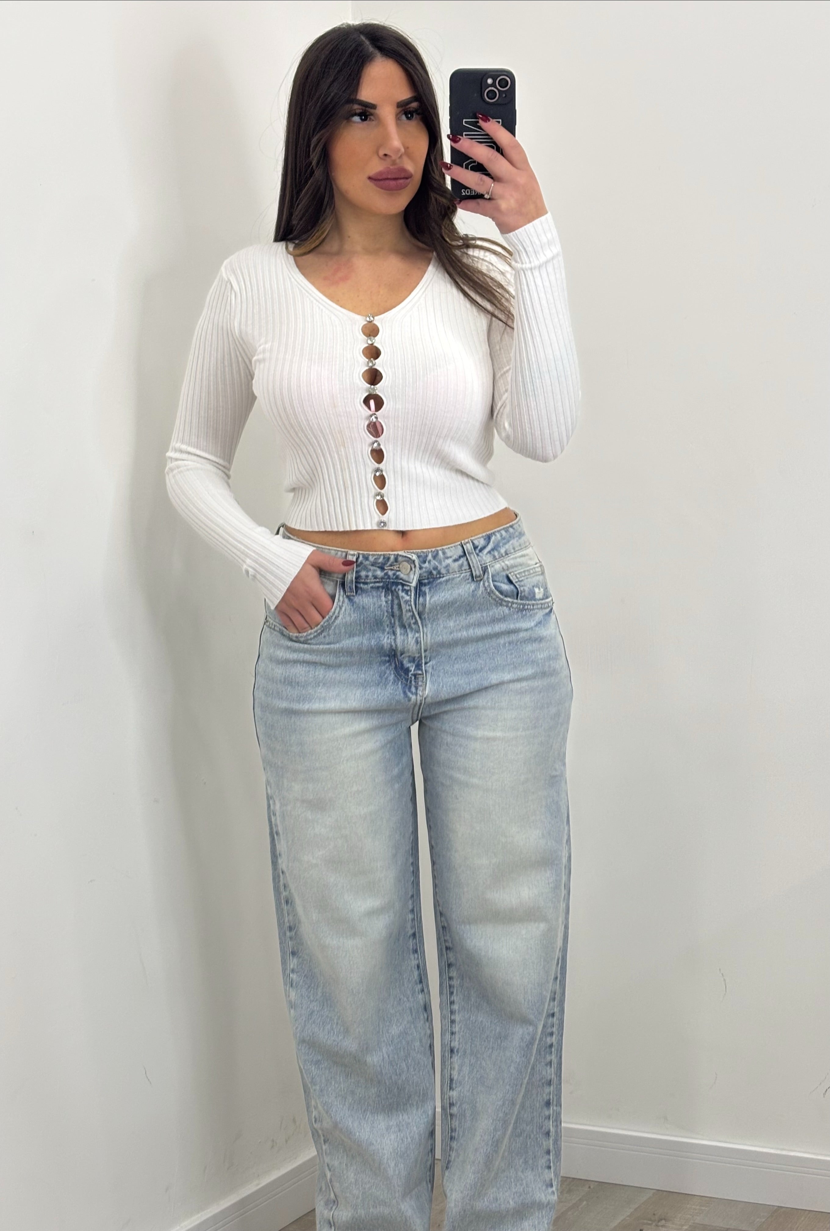 JEANS STRAPPO SUL RETRO