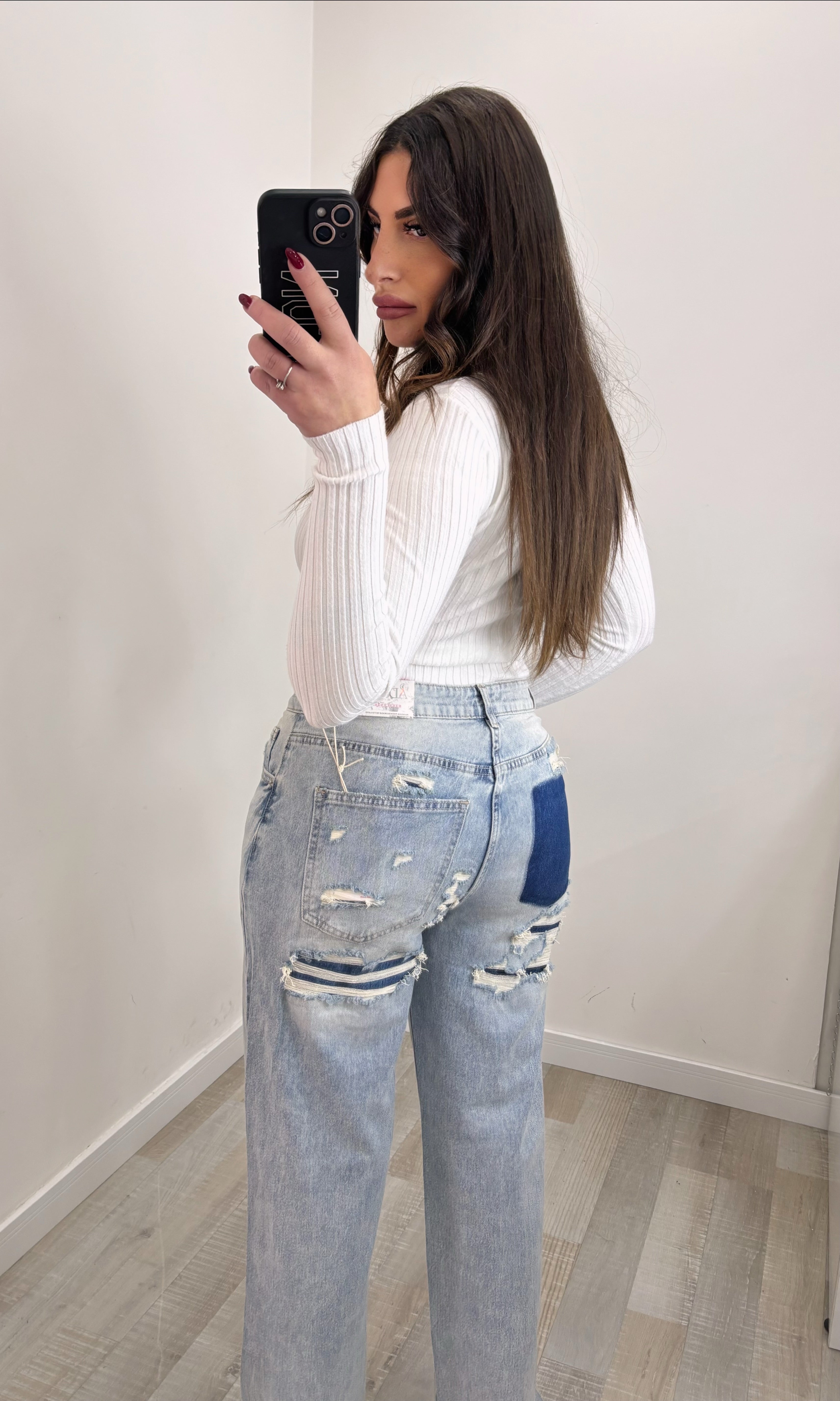 JEANS STRAPPO SUL RETRO